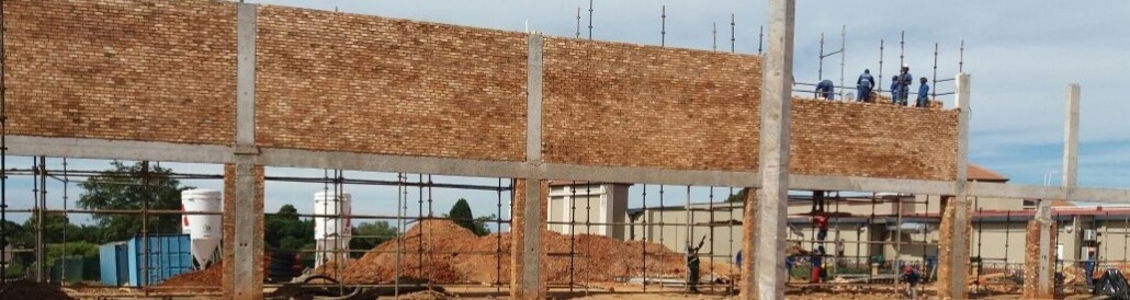 A brick building under construction